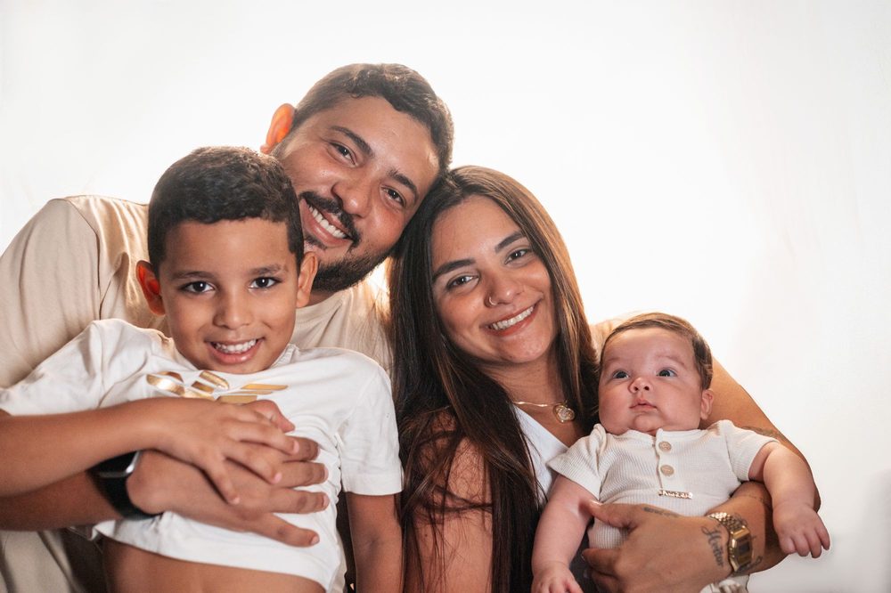 Joyful family portrait with parents and two children
